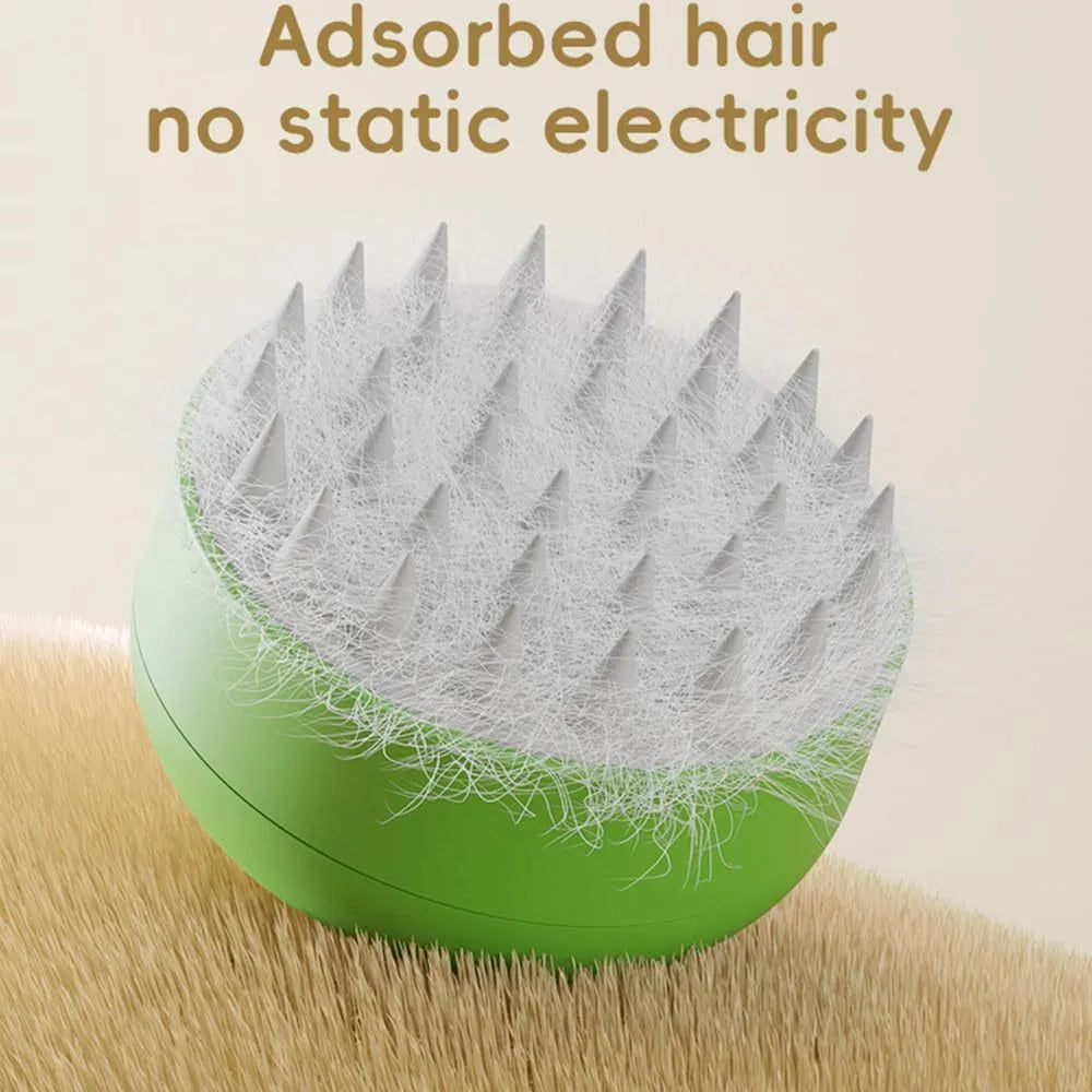Rechargeable silicone steam brush for cats and dogs in green or yellow with ergonomic handle for removing loose hair.