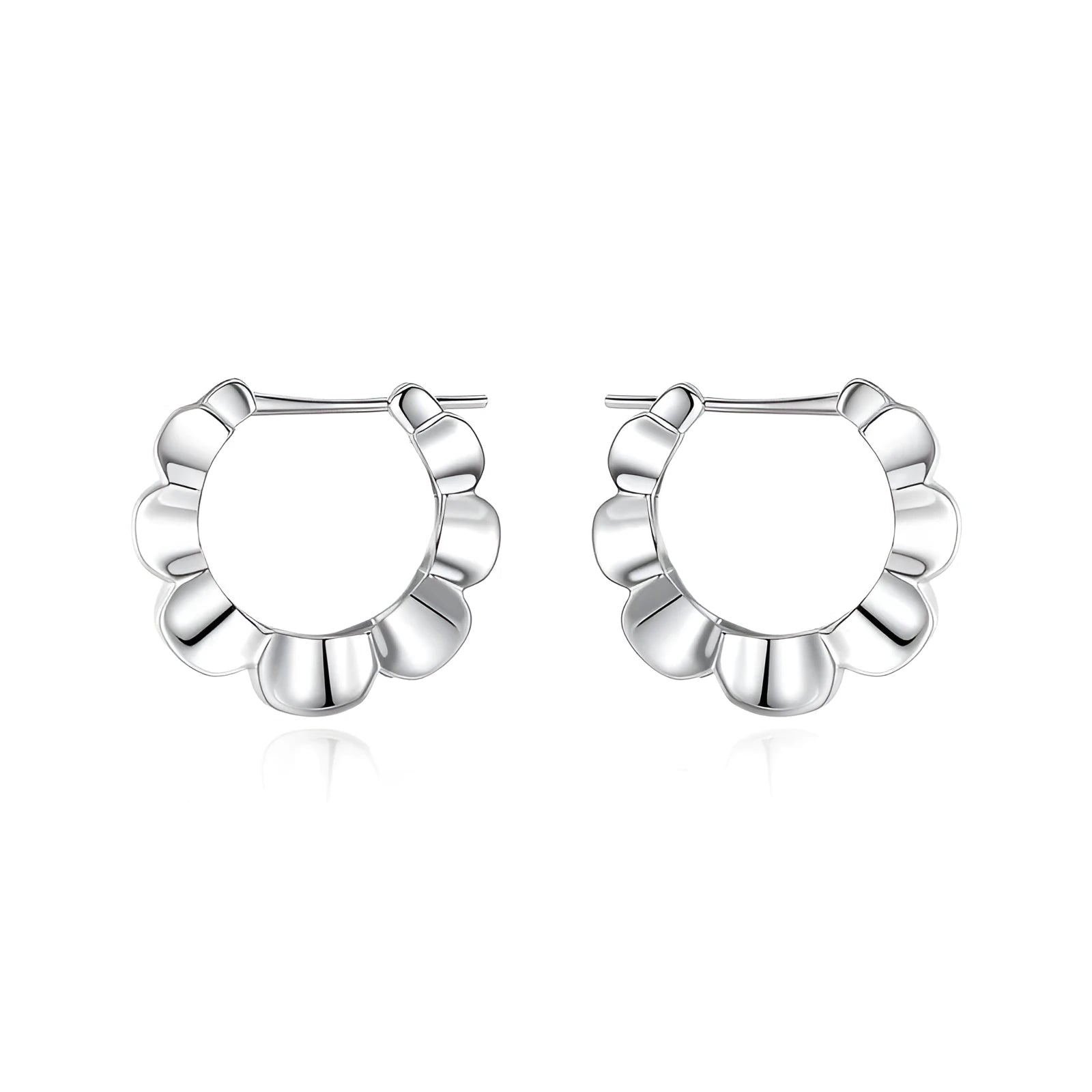 Pair of sterling silver geometric hoop earrings with round retro design elements