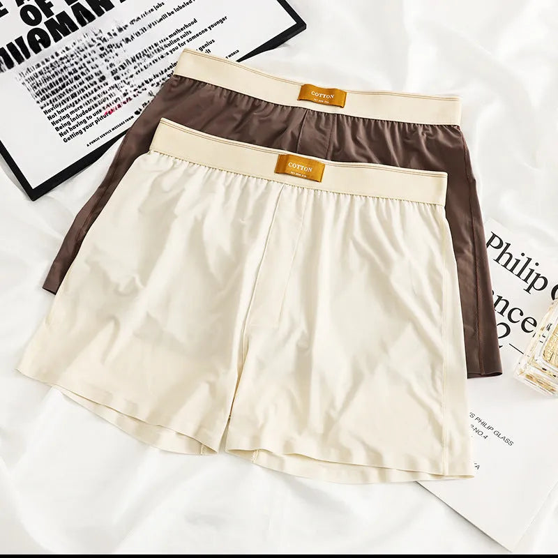 Pack of three men's solid colour ice silk underwear in loose fit mid waist design