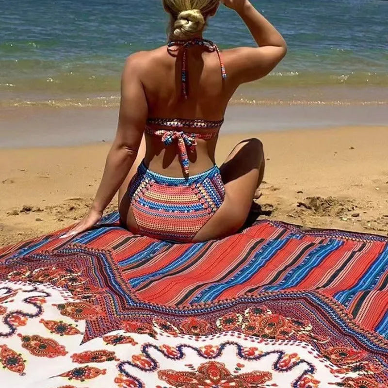 Women's three-piece swimsuit set showing high-waist briefs, cutout sleeveless top and matching coat in picture colour
