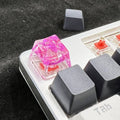 A high-transparency resin mechanical keyboard keycap with a starry sky design, shown in a choice of colours.