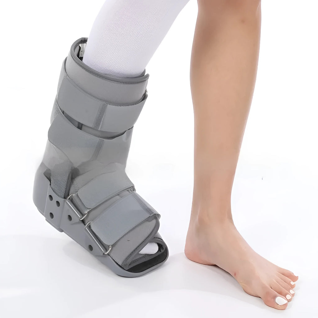 Black Achilles tendon rehabilitation walking boot with adjustable nylon straps and aluminium side supports