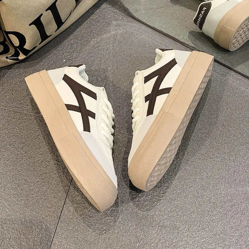 Low top casual board shoes in blue or brown with artificial PU upper and rubber sole