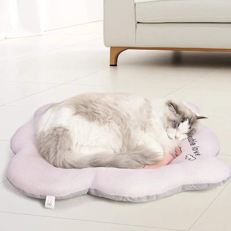 Ice silk pet cooling mat for dogs and cats in green and pink colours, available in four sizes