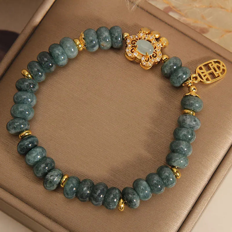 Women's natural emerald jade bracelet with abacus beads and alloy safety lock clasp
