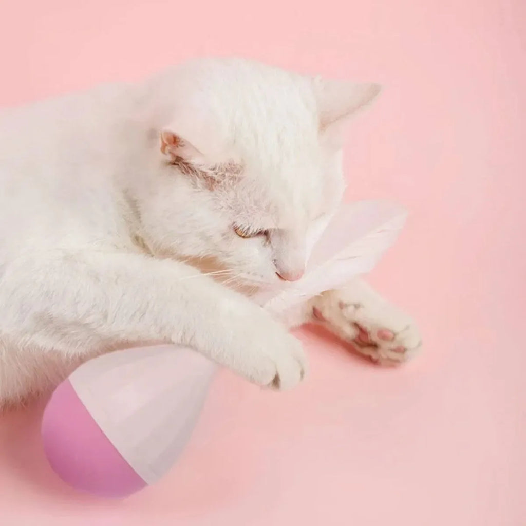 Green and pink feather tumbler cat toy with aluminium alloy frame and self-healing design