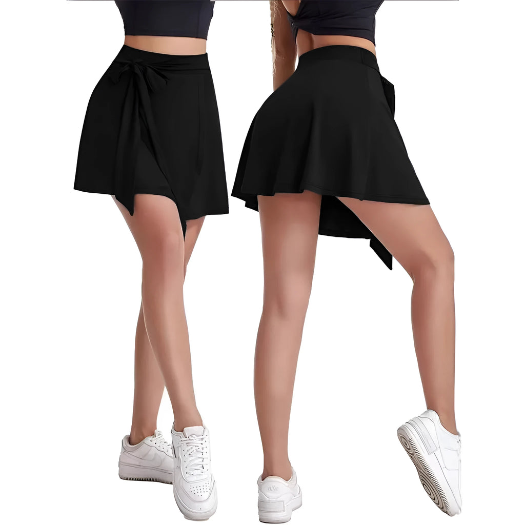 Black thigh-length culottes sports skirt with built-in shorts, high waist, and micro-elastic polyester fabric.