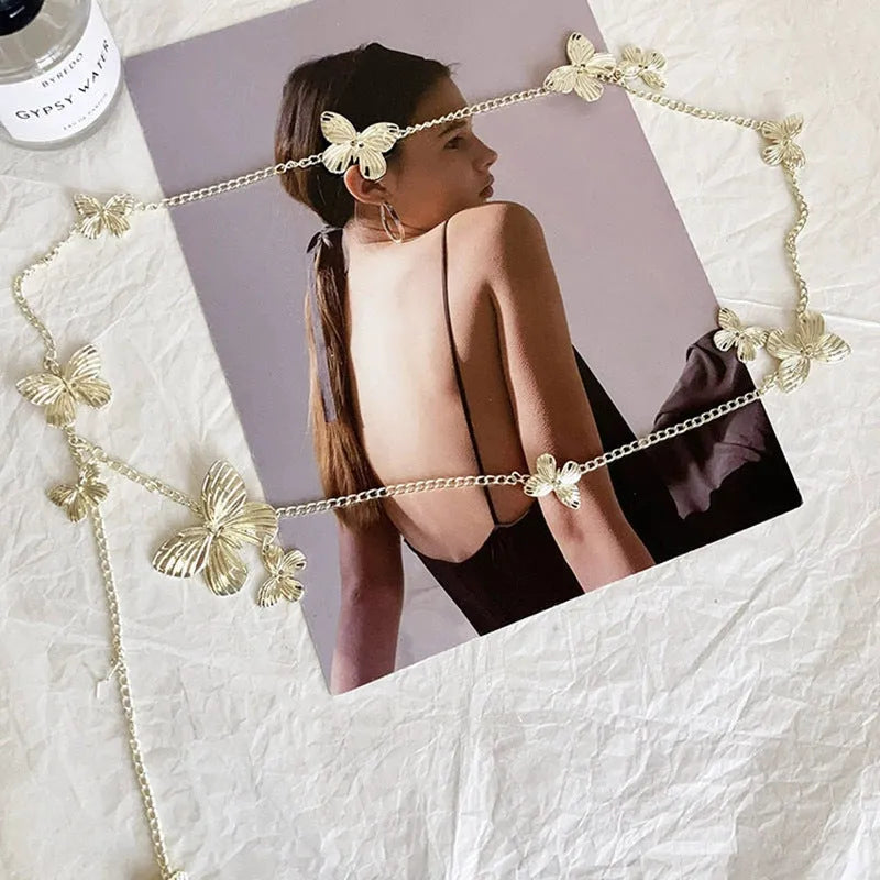 Gold or silver alloy waist chain belt with butterfly design measuring 104cm long and 40mm wide
