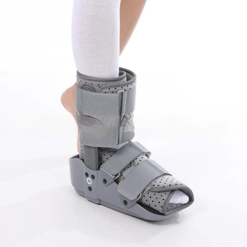 Black Achilles tendon rehabilitation walking boot with adjustable nylon straps and aluminium side supports