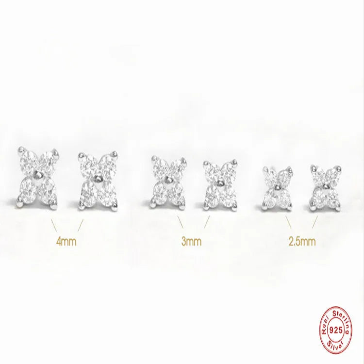 S925 sterling silver petal crystal flower stud earrings in gold finish on a white background.