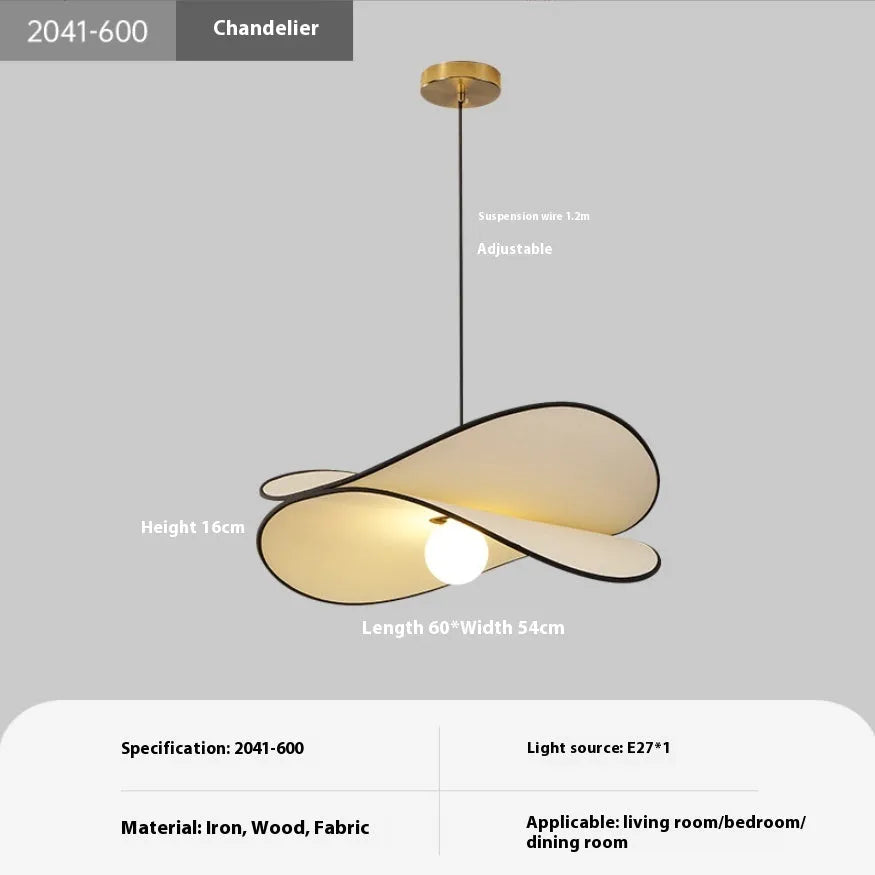 French artistic modern fabric potato chips chandelier pendant light in a bedroom setting.