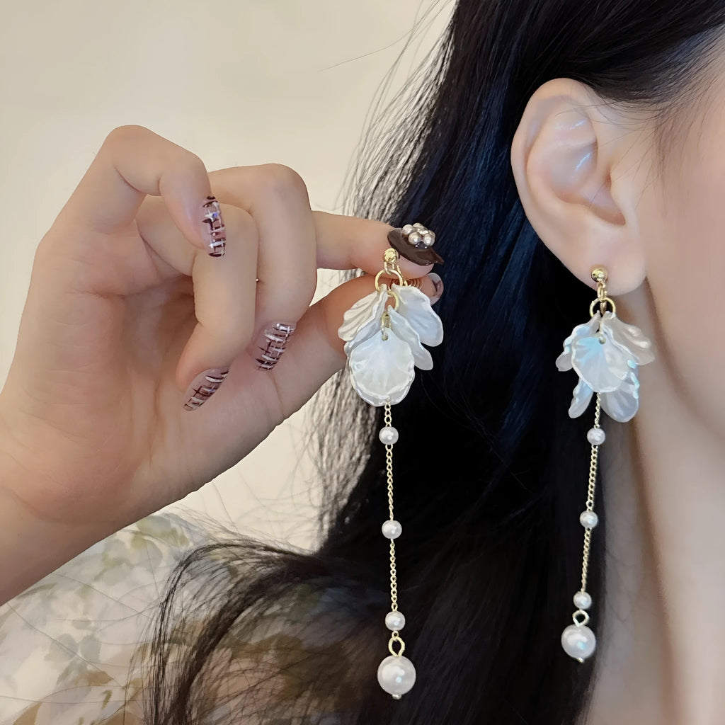 Women's acrylic shell pearl tassel earrings with approximately 8.8cm length and multiple clip options