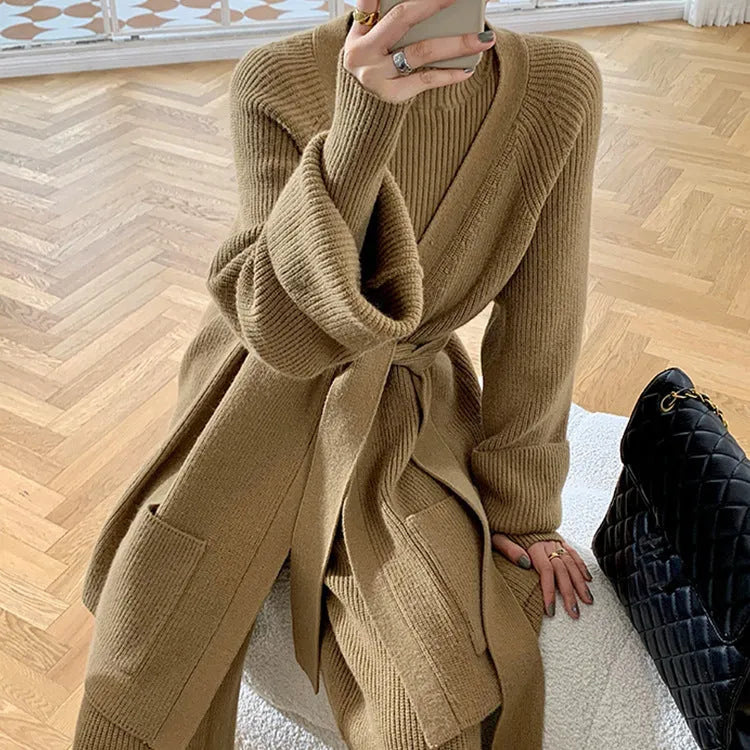 Women's apricot knitted wide-leg pants and cardigan three-piece set with leather stitching detail.