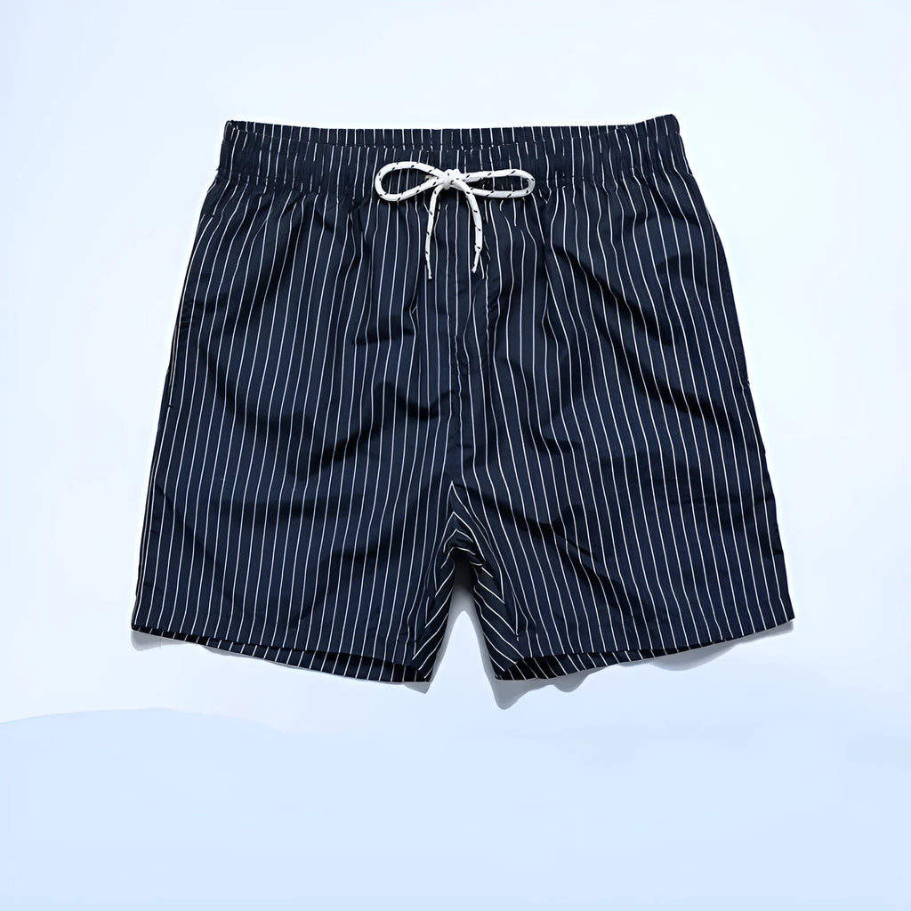 A pair of striped beach shorts in a polyester blend fabric, shown in a choice of colours with a straight leg cut.