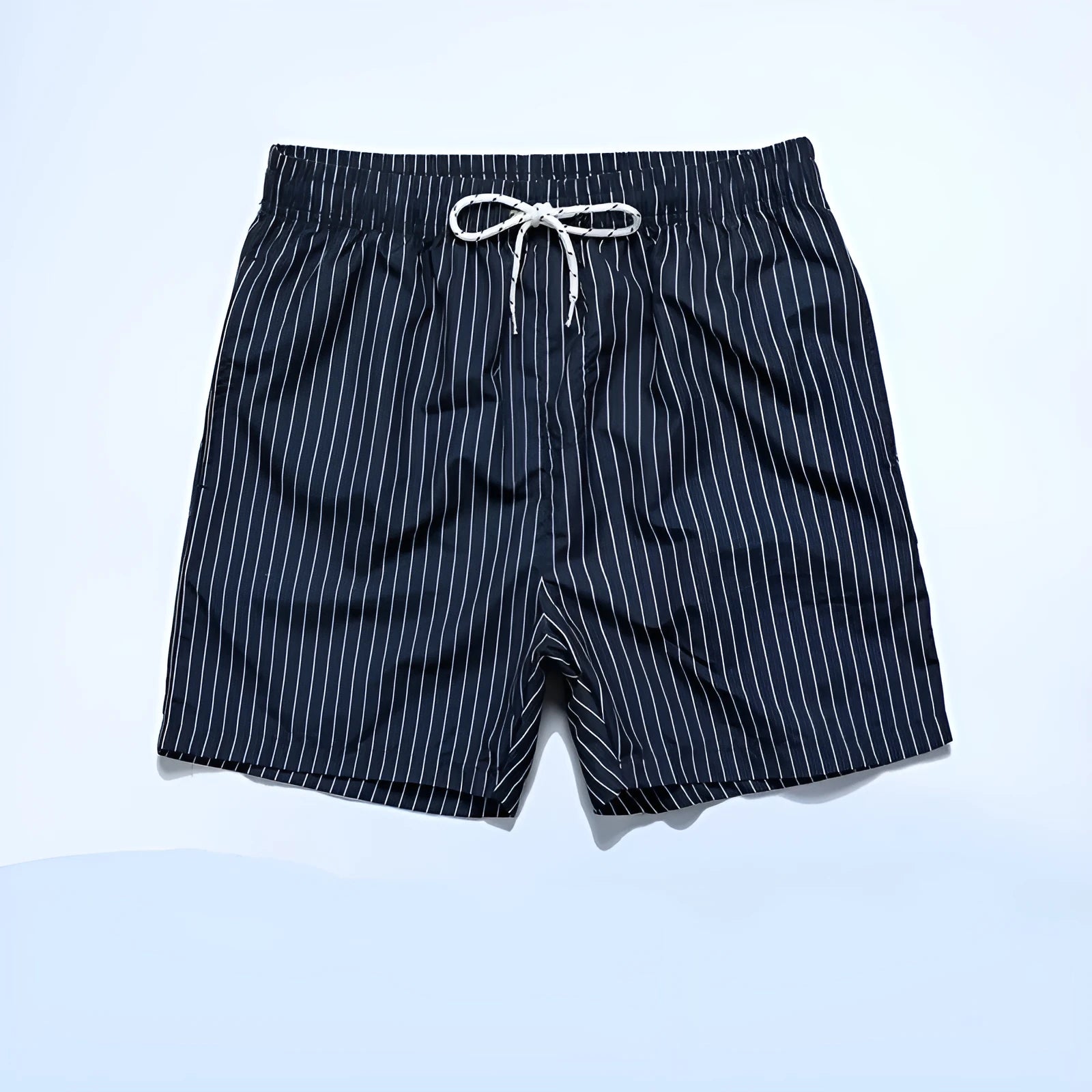 A pair of striped beach shorts in a polyester blend fabric, shown in a choice of colours with a straight leg cut.