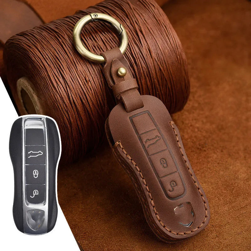 Genuine cowhide leather Porsche key cover with retro bag buckle in blue or brown colour.