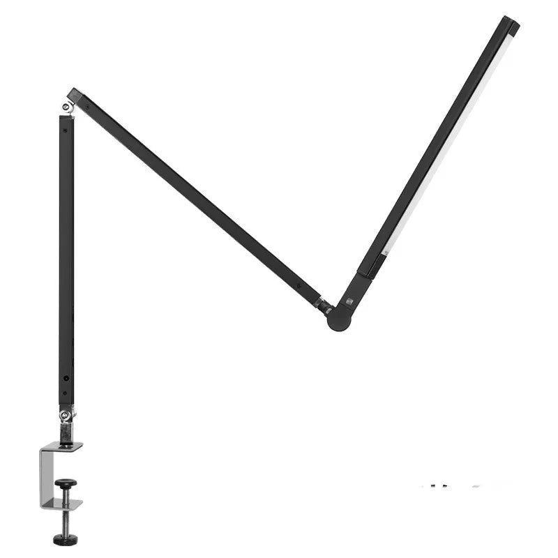 Adjustable aluminium desk lamp with clip base and remote control, shown in dazzling black finish.