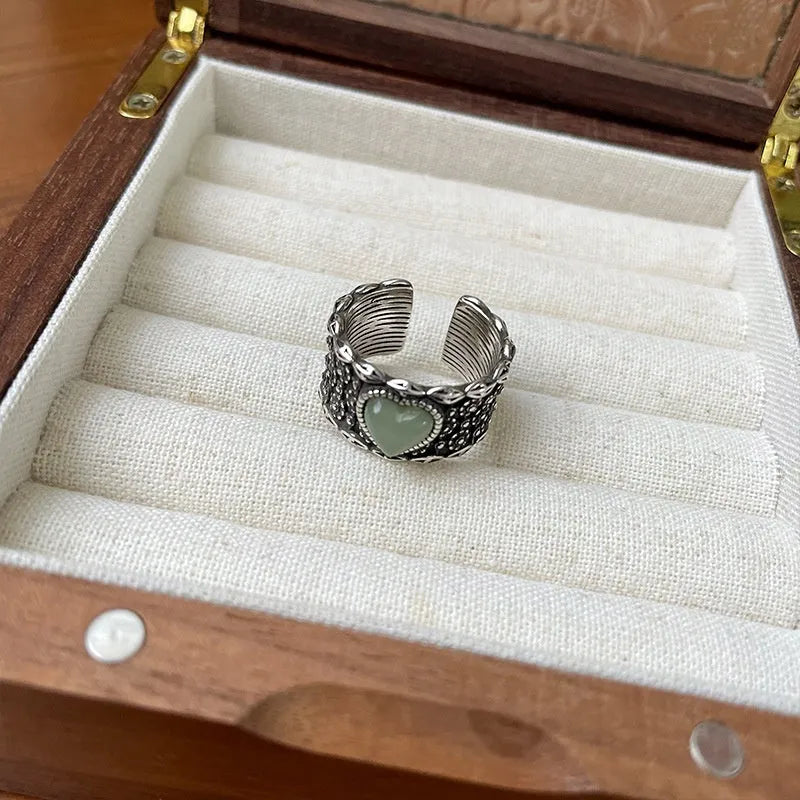 Retro wide-faced adjustable heart ring in white copper plated silver with open design