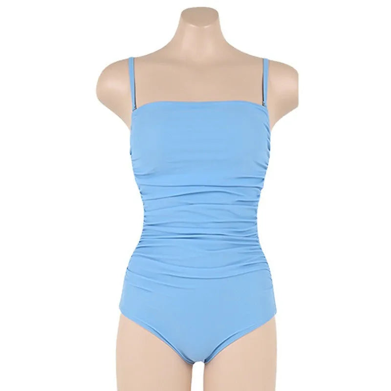 Blue one-piece swimsuit with sling neckline and pleating detail across the belly.