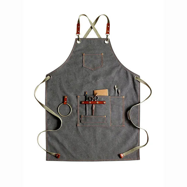 Canvas apron with cross-back straps in camel colour for kitchen and gardening protection