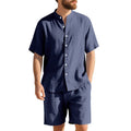 Man wearing a light-coloured short sleeve linen shirt and matching shorts from a casual summer suit set.