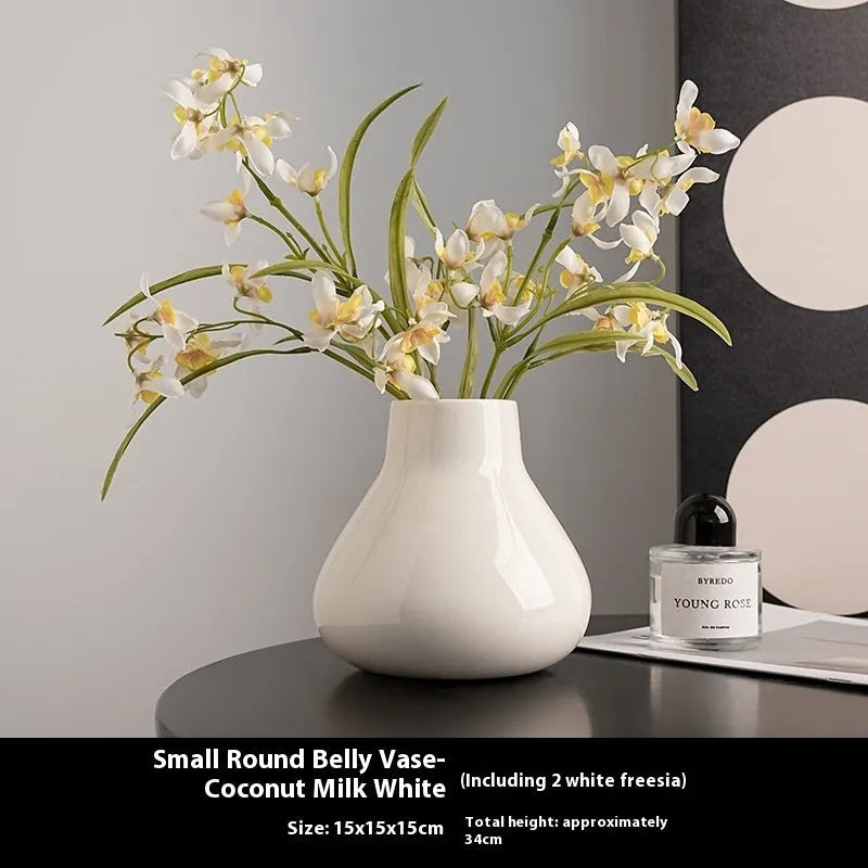 Ceramic decorative vase with artificial orchid flowers in black or white colour options