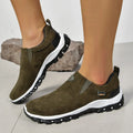 Men's grey slip-on shoes with round toe and shallow opening on rubber sole