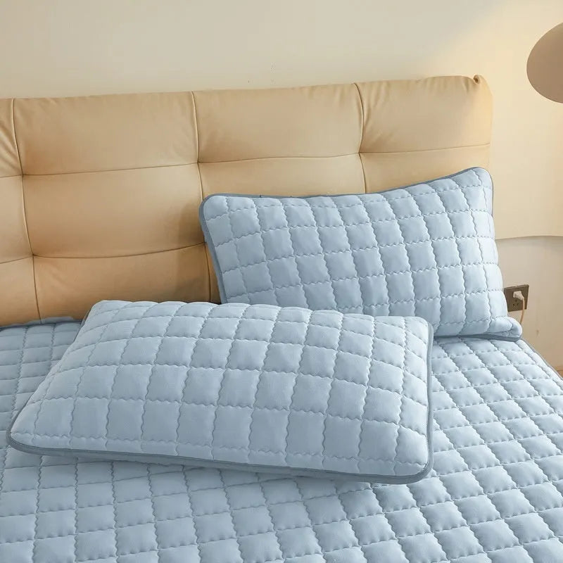 Class A maternal and child grade waterproof fitted sheet in blue colour with quilted edging