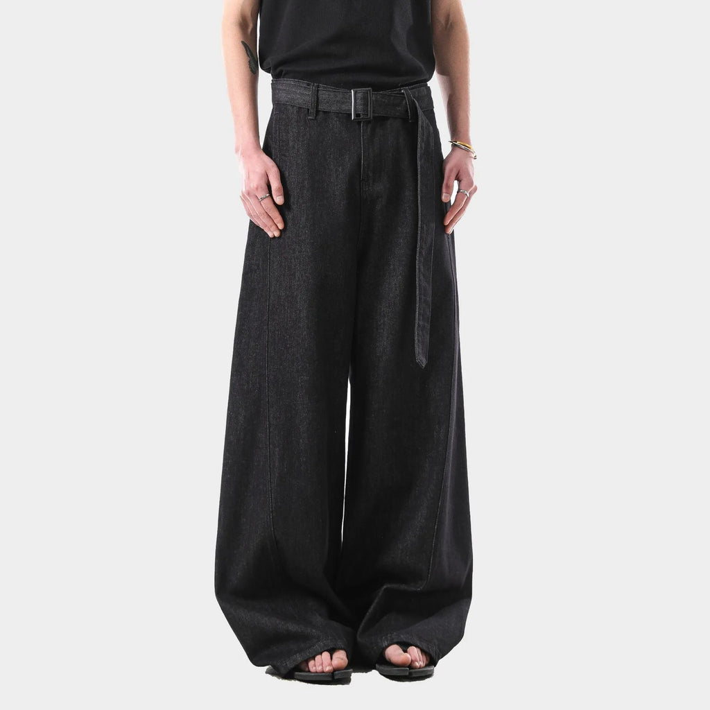 Black high waist straight leg women's jeans made from cotton denim on a model.