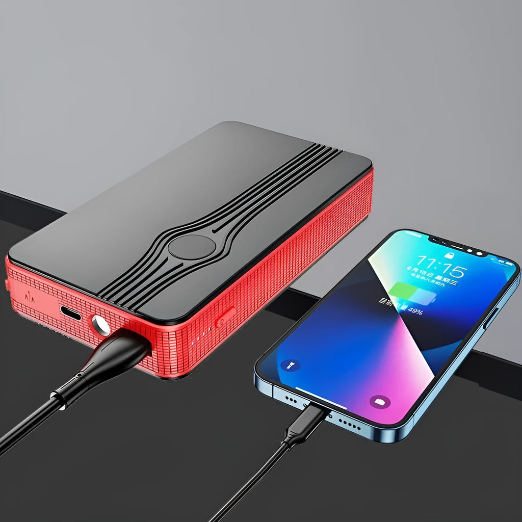 Red K4-E automotive emergency jump starter and power bank unit with USB cable