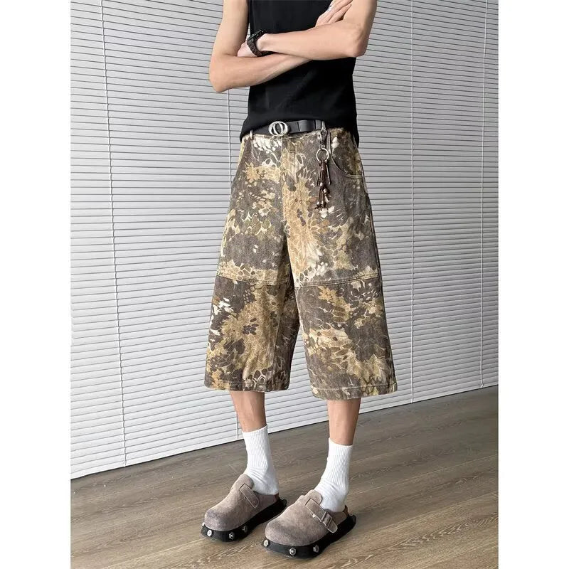 Yellow jeans with snake pattern camouflage design and cropped length