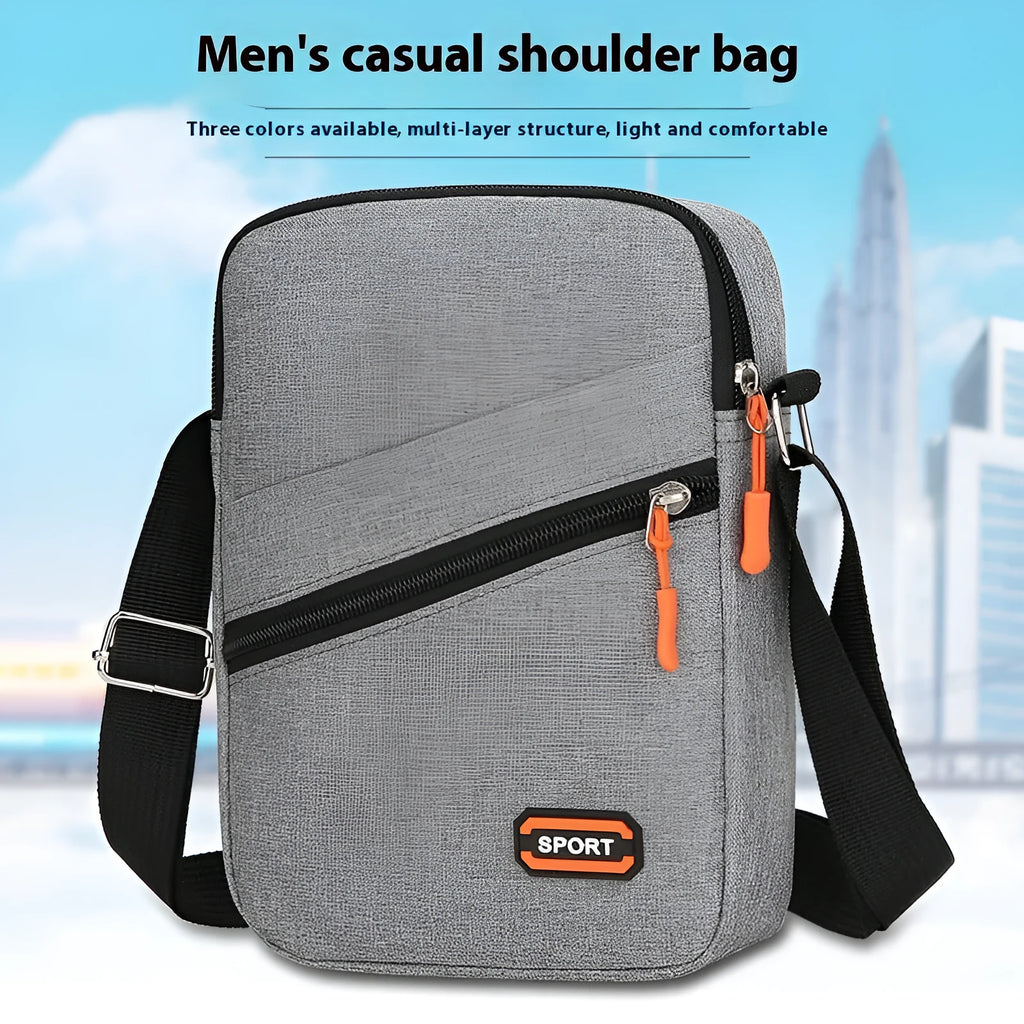 Lightweight Oxford cloth crossbody commuter bag in a solid colour with contrast detail.
