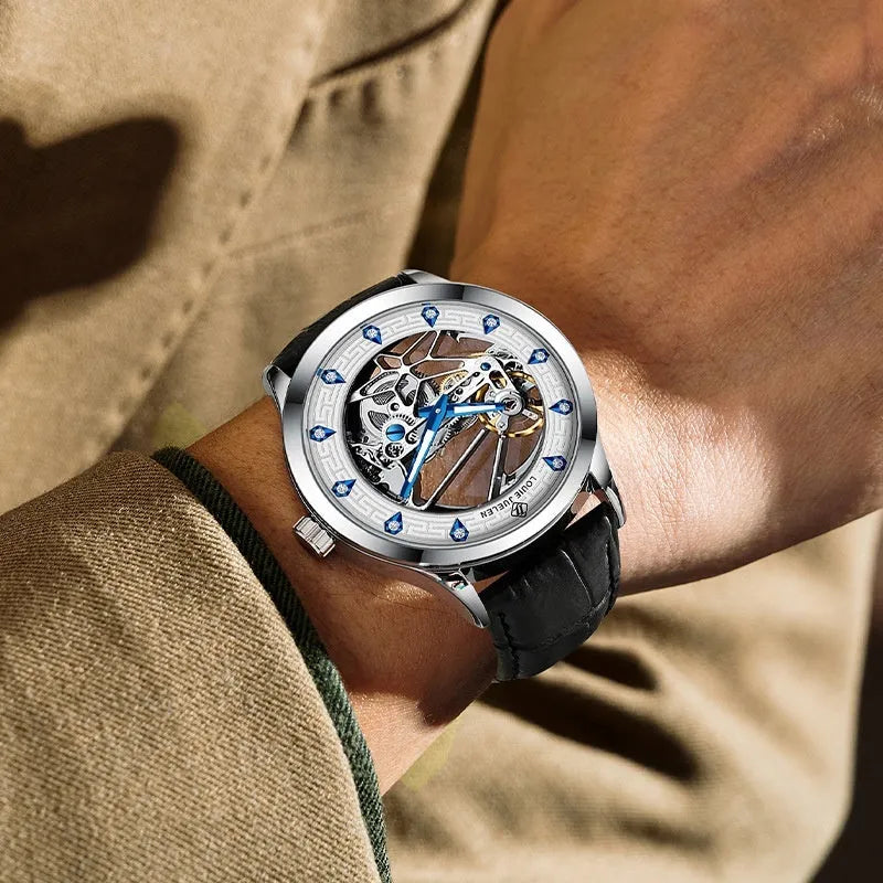 Men's silver mechanical watch with luminous hands on black leather strap
