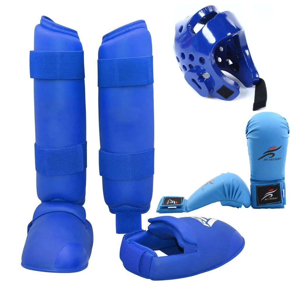 Red and blue martial arts protective gear set showing leg guards, helmet and boxing gloves for karate taekwondo training