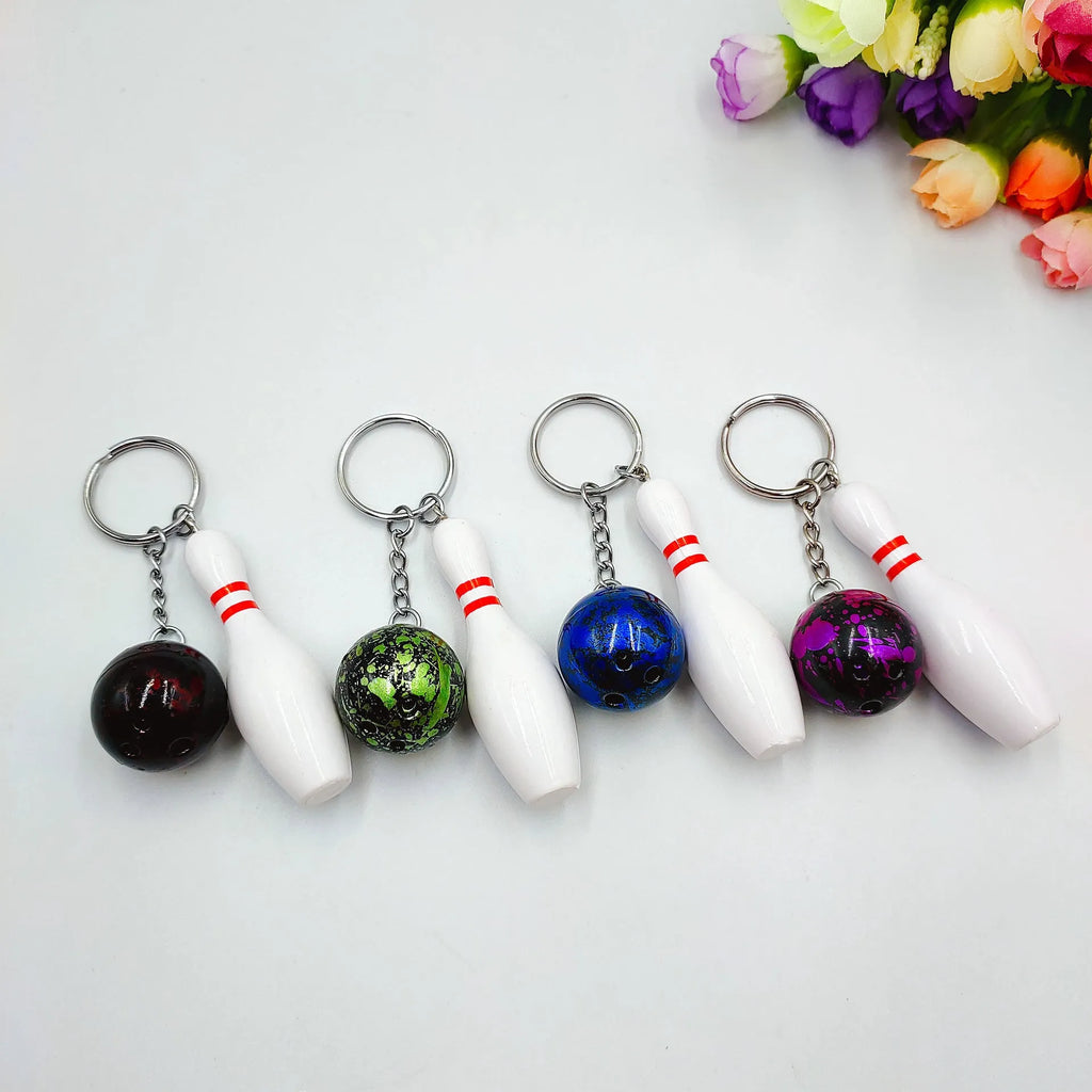 Mini bowling ball simulation keychain pendant in dark red, blue, purple and green colour options