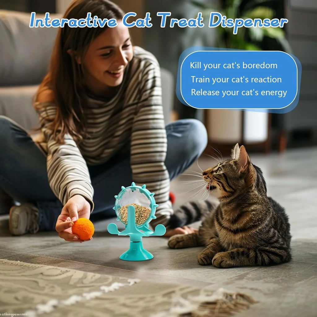 Blue interactive pet puzzle toy with spinner and suction cup base for cats and small dogs.