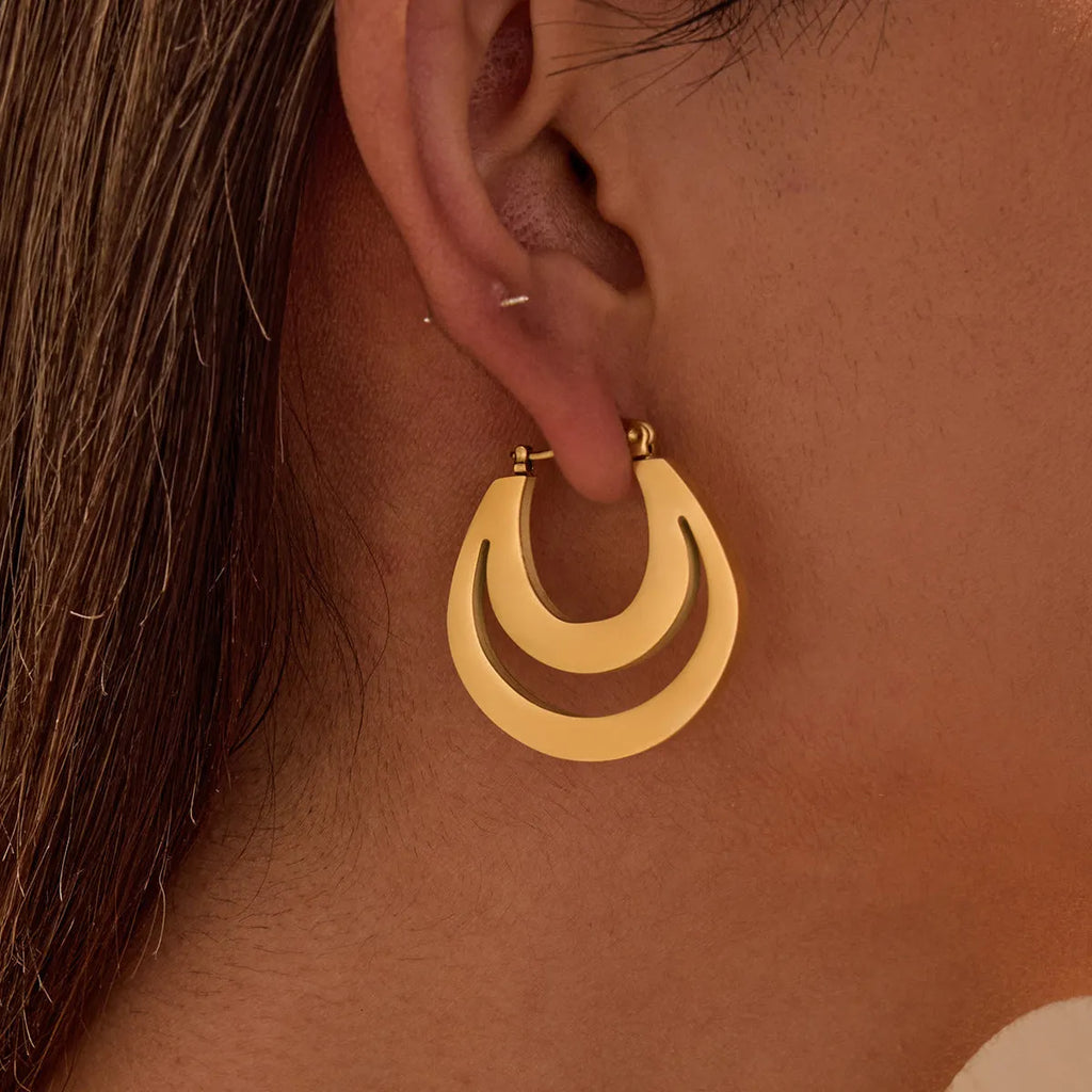 Geometric gold plated French earrings with round ring elements on stainless steel