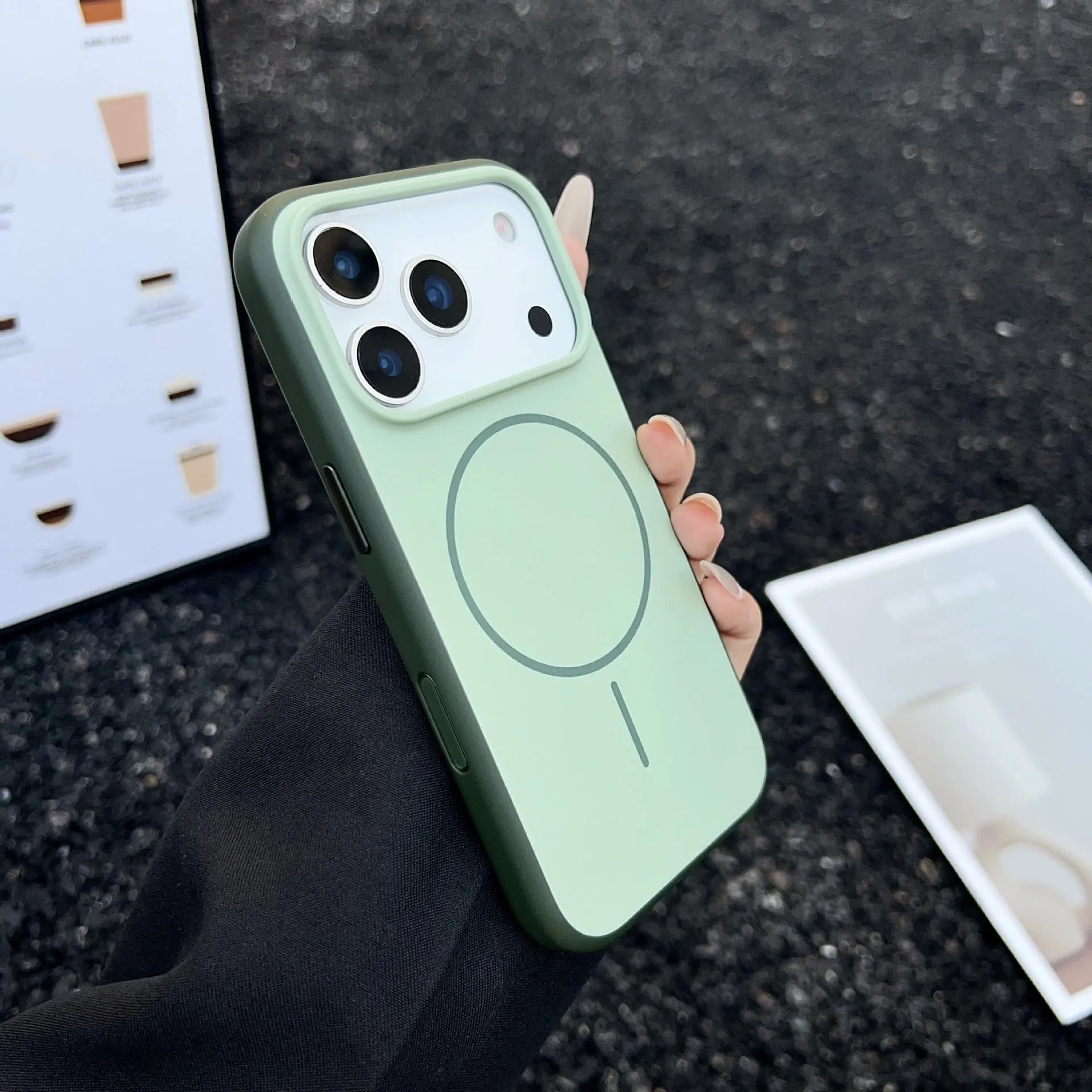 Blue frosted magnetic iPhone case showing AI camera button and precise cutouts for ports and camera.