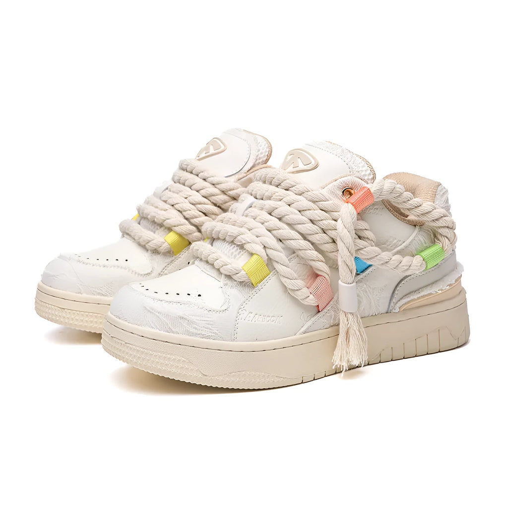 Creamy white retro low-top skate shoes with old damage lace and a platform sole