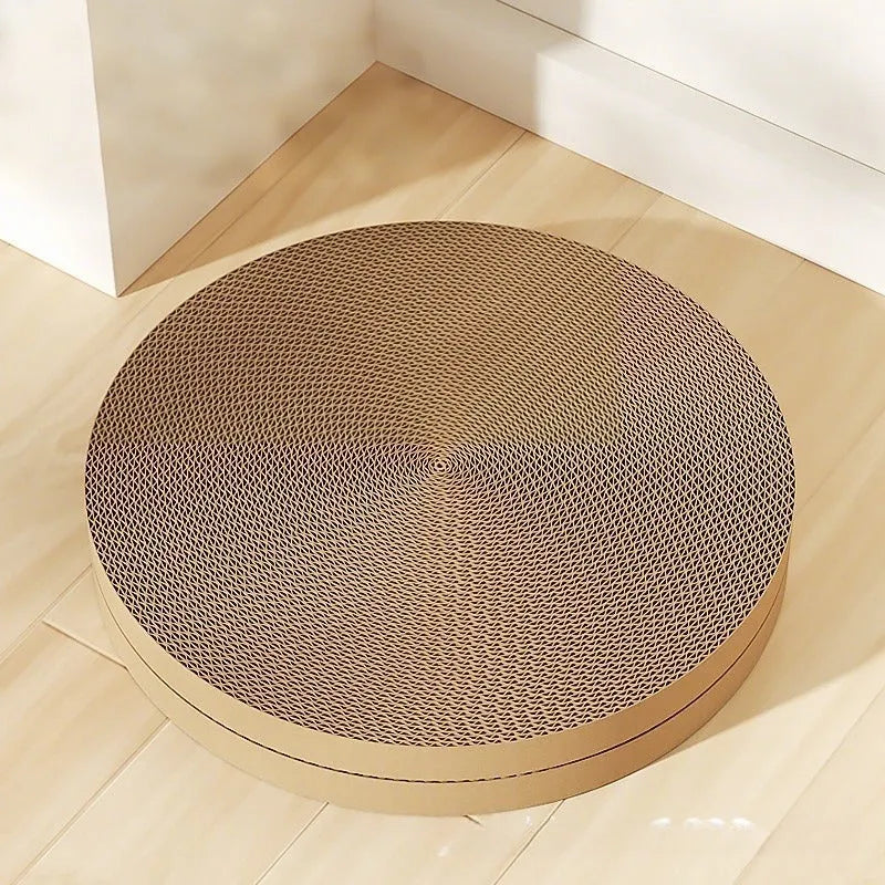 Green round cat scratching board with corrugated cardboard surface measuring 55cm diameter