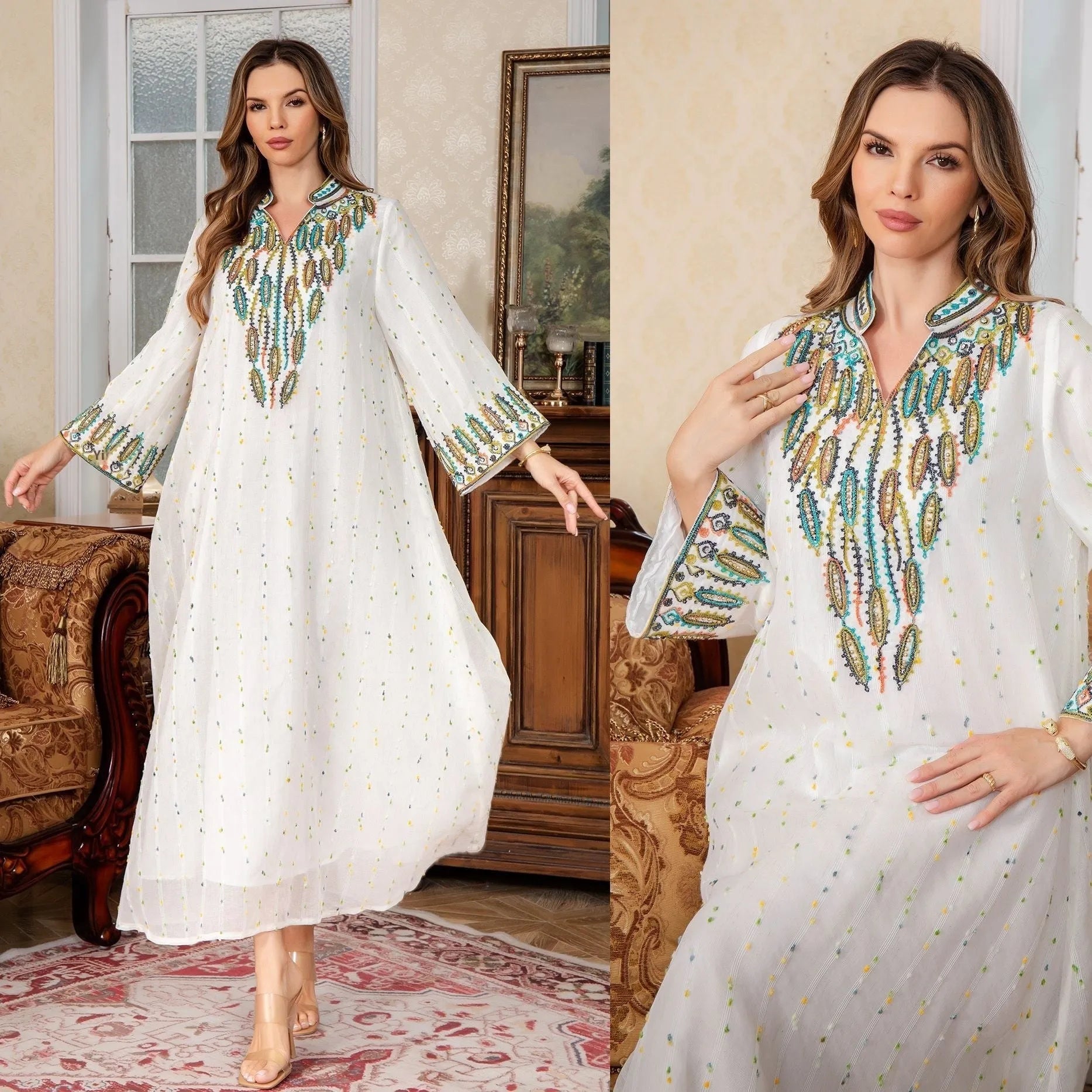 White long Arabic robe dress for women with long sleeves on a hanger
