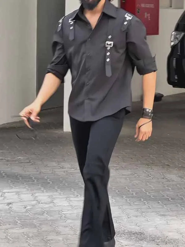 Men's black button-up utility shirt with long sleeves and regular fit on mannequin