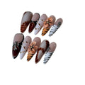 Handmade gel nail stickers with leopard, cross, and flower prints in a pack of ten.