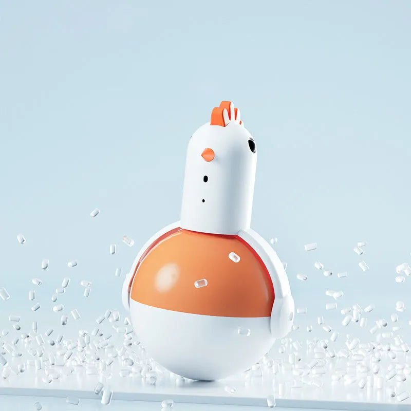Green or orange electric chicken cat toy with laser light and sound functions on a flat surface