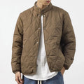 Men's black diamond lattice quilted winter jacket with lengthened cut and loose fit