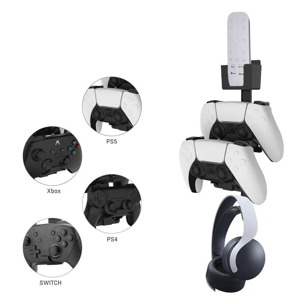 White adhesive wall hook holding a game controller and headphones