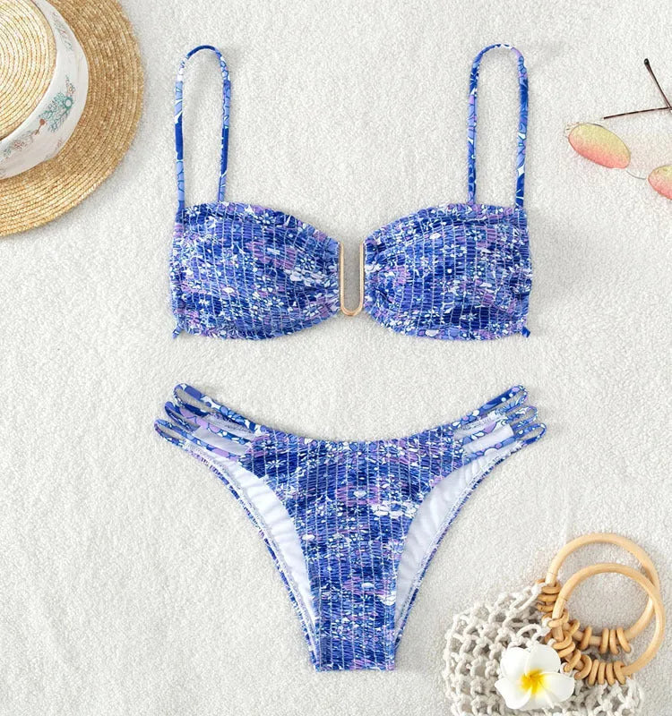 Women's high-waisted floral bikini swimsuit in blue, orange, pink, or rose red on a mannequin