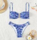 Women's high-waisted floral bikini swimsuit in blue, orange, pink, or rose red on a mannequin