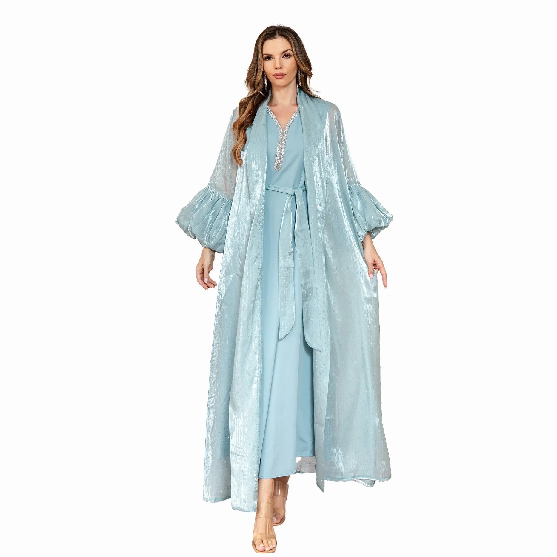 Blue Arabic style two-piece dress with long sleeves, long skirt, and rhinestone decoration.
