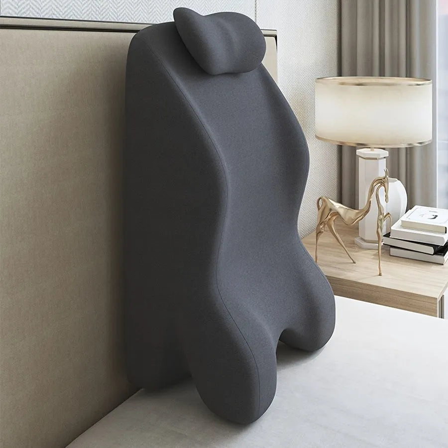 Stomach sleeping pillow for reading in bed shown in blue colour option